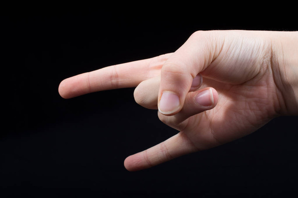Sinal de rocha Mãos de gestos com indicador e dedo mindinho em forma de chifres
. - Foto, Imagem