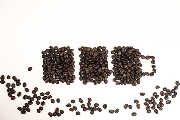 Roasted Coffee Beans background texture isolated on white background with copy space for text - Fotó, kép