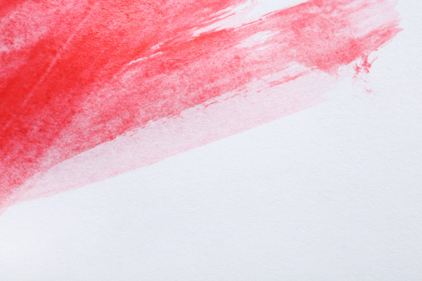 Abstract brushstroke of red paint isolated on white. Space for text - Valokuva, kuva