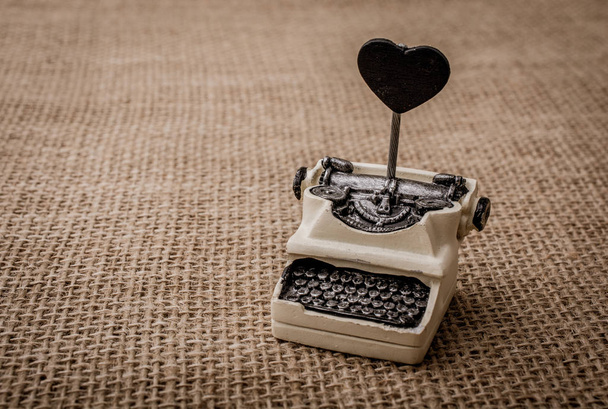 Retro syled apró írógép modell vászon alapon - Fotó, kép