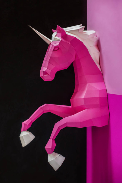 Paper unicorn head on a colored background. Geometry, bright and pastel colors. - Fotografie, Obrázek