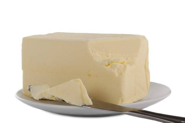 un plato con mantequilla cremosa
 - Foto, imagen