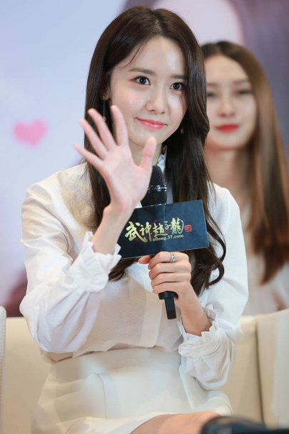 Lim Yoon-a of South Korean idol group Girls' Generation attends a promotional event for an online game in Shanghai, China, 31 July 2016. - Foto, afbeelding
