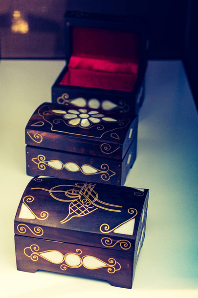Ancient style wooden treasure chest with mother of pearl inlay - 写真・画像