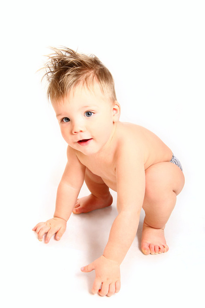mooie naakte kind zittend op witte achtergrond - Foto, afbeelding