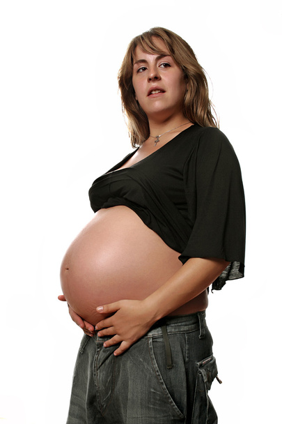 Young pregnant woman isolated on white background - Valokuva, kuva
