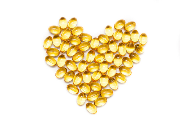 heart shape of Fish oil, soft capsule, omega, supplement isolated on white background, healthy product concept - Foto, Imagem
