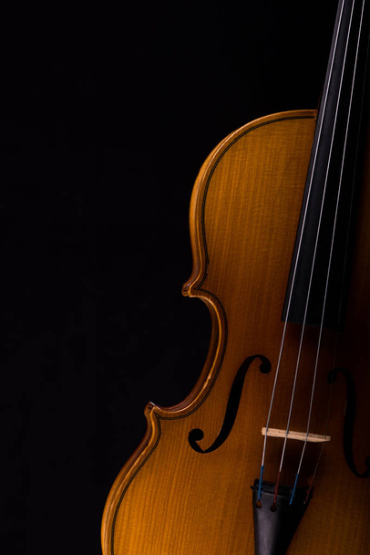 Violin music instrument closeup isolated on black - Фото, изображение