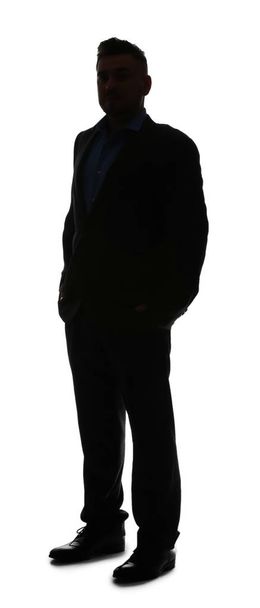 Silhouette of businessman on white background - Foto, immagini