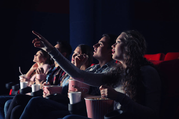 Friends watching movie in cinema - Photo, Image