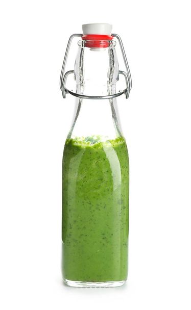 Bottle of healthy vegetable juice on white background - Valokuva, kuva