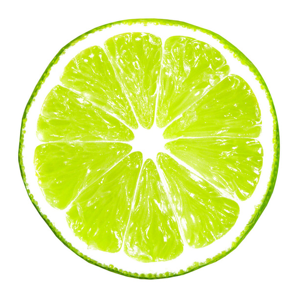 Lime slice isolated on white background - Фото, изображение