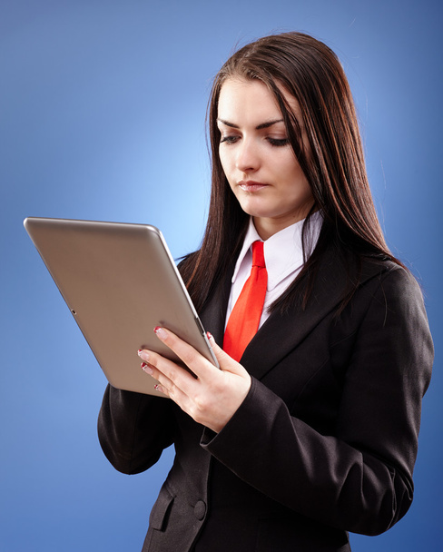 Businesswoman using a tablet - Foto, afbeelding