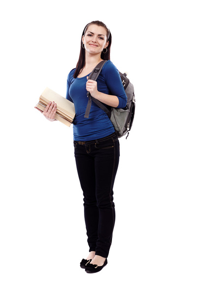 Student girl with backpack and books - Foto, immagini