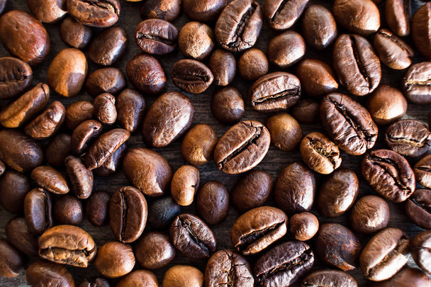 焼かれたコーヒー豆の背景 - 写真・画像