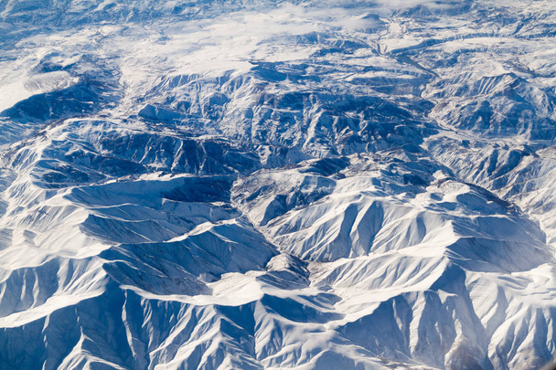 Aerial view of snow covered mountains in northwestern Iran - Foto, Bild
