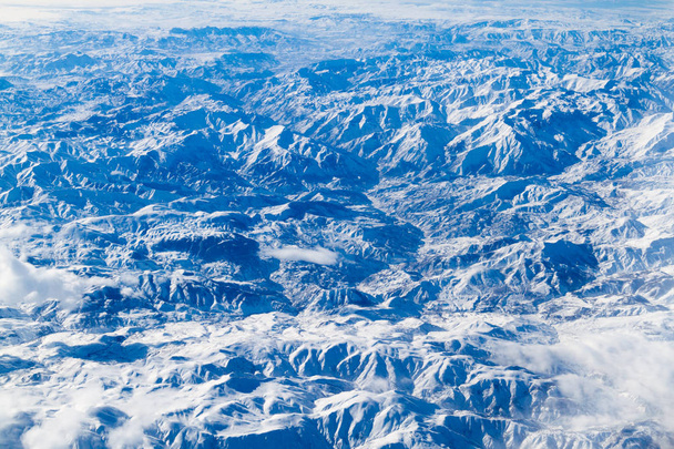 Aerial view of snow covered mountains in northeastern Iran - Фото, зображення