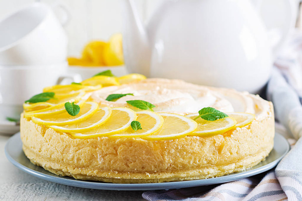 Tart with lemon curd and meringue. Lemon pie. American cuisine. Dessert. Top view - Photo, Image