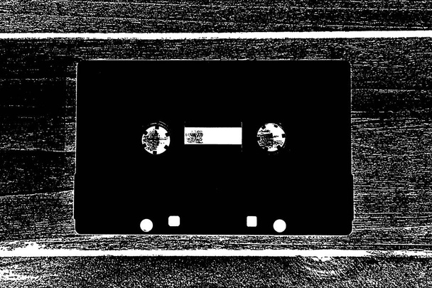 Old tapes cassettes for recording on stylized background - Photo, Image