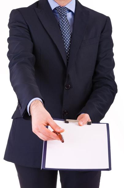 Businessman with pen and clipboard. - Photo, Image