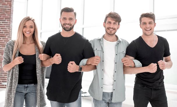 Smiling Business team standing in office and look at camera - Фото, зображення