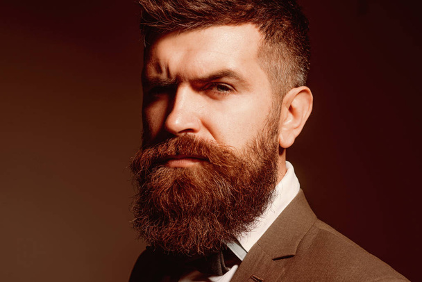 Barber and beauty supply business. Bearded man after barber shop. Man with long beard in business wear. Business as usual. Mens fashion. The fashion business is the opposite to glamorous - 写真・画像