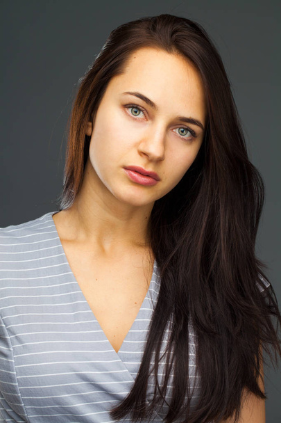 Fashion sexy brunette woman portrait. Beautiful model. Studio isolated, gray background. - Foto, immagini