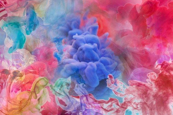 Motion Color drop in water,Ink swirling in ,Colorful ink abstraction. - 写真・画像