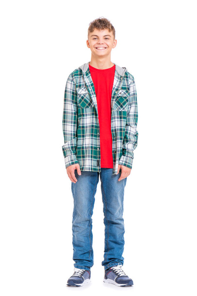 Full length portrait of young caucasian teen boy, isolated on white background. Handsome child -Funny teenager looking at camera and smiling. - Фото, зображення