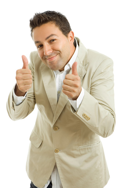 Young casual man going thumbs up - Foto, afbeelding