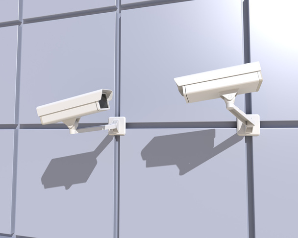 Überwachungskamera an der Fassade des Gebäudes angebracht - Foto, Bild