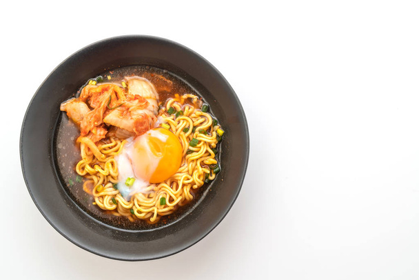 Korean instant noodles with kimchi and egg isolated on white background - 写真・画像