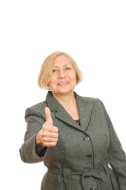 Portrait of a happy senior woman showing thumb up - Fotoğraf, Görsel