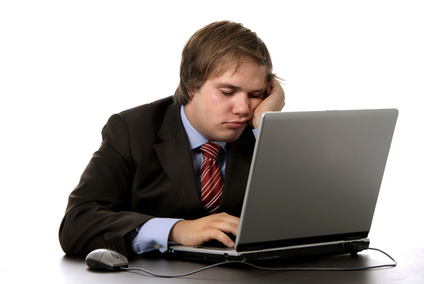 Young business man sleeping on the laptop - Фото, зображення