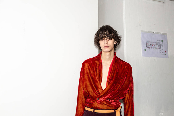 MILAN, ITALY - JANUARY 13: Beautiful model poses in the backstage just before Bed J.W. Ford show during Milan Men's Fashion Week on JANUARY 13, 2019 in Milan. - Zdjęcie, obraz