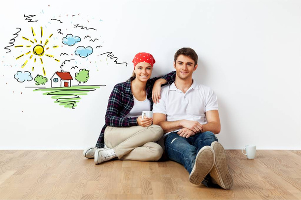 happy young man and woman dreaming of new house - Foto, Imagen