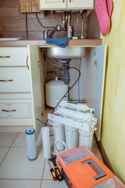 Installing a water filter - Photo, Image