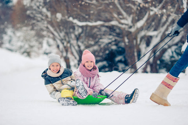 Family of dad and kids vacation on Christmas eve outdoors - Photo, Image