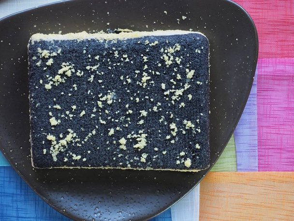 Comida coreana Sésamo negro en polvosoya torta de arroz glutinoso
 - Foto, imagen