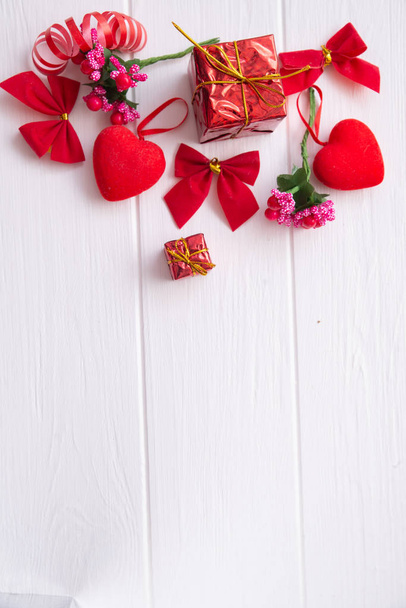 Conceptual still life for Valentine's Day on a wooden white background with space for text - Photo, Image