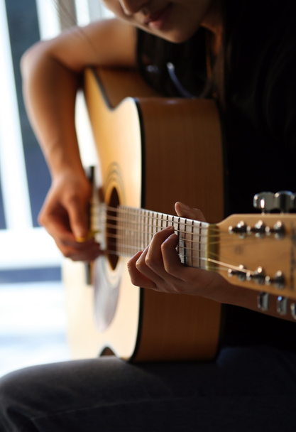 Playing guitar - Фото, изображение