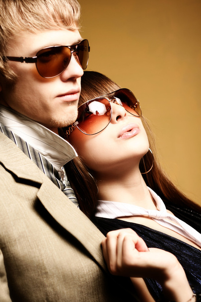 Young couple wearing sunglasses - Fotografie, Obrázek