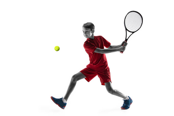 Young tennis player isolated on white - Φωτογραφία, εικόνα