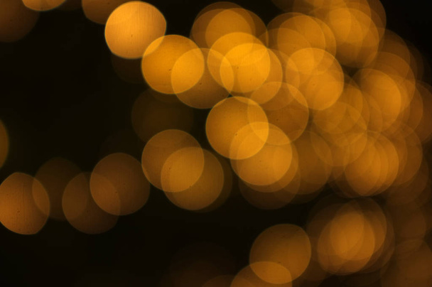 Gouden bokeh abstracte licht, oranje achtergrond, Concept liefde, zomer - Foto, afbeelding