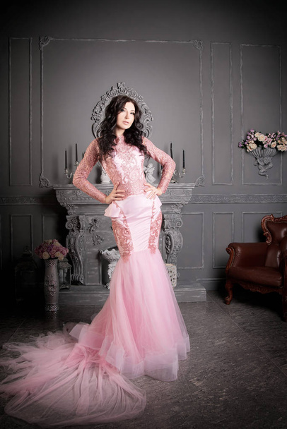 Full length portrait of gorgeous woman in fancy dress posing in vintage luxury interior - Zdjęcie, obraz