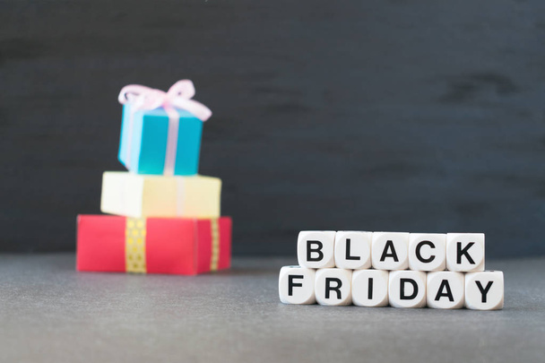 Sale banner with text word Black Friday and multicolored gift boxes. Black Friday sale mockup - Фото, зображення
