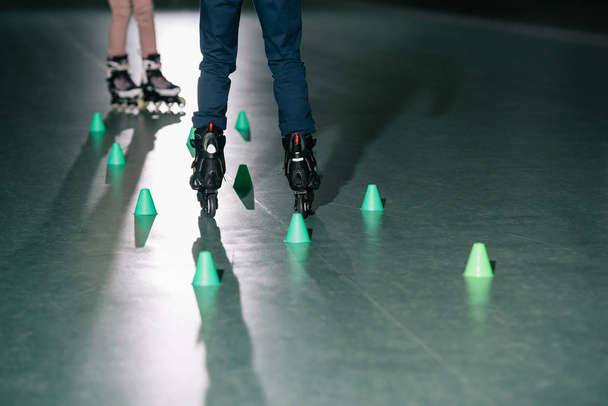 Partial view of preteen roller skaters training together - Foto, Imagem