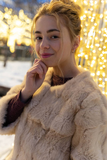 Street New Year's photo session on the streets of festive Moscow. - Fotó, kép