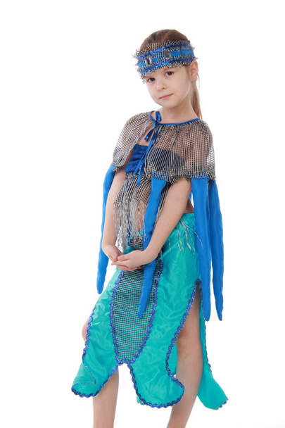 Expressive little girl dressed in a blue costume and dance - Foto, immagini