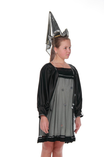 Girl in a beautiful dress evil fairy - Фото, изображение